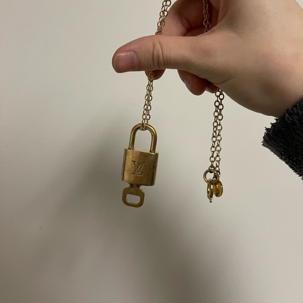 Authentic Louis Vuitton Lock and Key on a gold chain